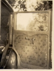 Anna Ingraham's Duesenberg car door detail; photo provided by Joseph Auch.